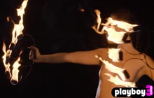 Teen  playing with fire and posed totally naked in the dark